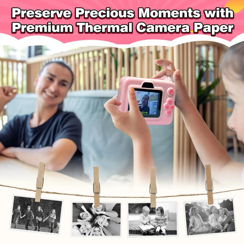 Kids Instant Camera Paper Refill Set 6 Thermal Printing Paper Rolls For Most Kid Cameras White Glossy Photo Paper, hands holding pink kid camera