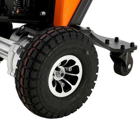 Heavy Duty Electric Powered Tugger With 2,200 Lbs Capacity To Easily Haul Massive Loads Through Tight Spots and Move Gear Around Obstacles Safely Using Precision Controls Plus Emergency Stop and Horn tire close-up, durable tread detail.