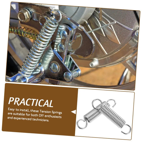 Grab This 8 Piece Small Compression Spring Kit With Hook Ends Perfect For Elevating Electric Vehicle Parking Stands And Securing Ladder Foot Supports To Keep Your Gear Rock Solid And Ready For Any Adventure. silver hook-end tension spring on metal stand, small compression spring kit