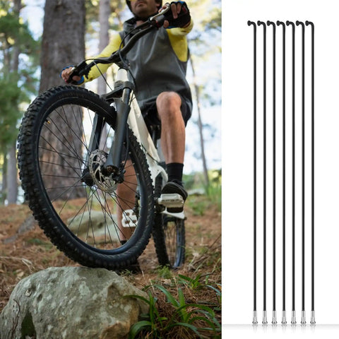 36Pcs 14G J Bend Mountain Bike Spokes Set Premium Steel Wheel Spokes 260mm Length MTB Rim And Hub Compatible Durable Cycling Spokes For Build And Repair beside a mountain biker in action