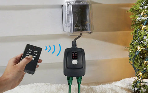 Super Tough Weatherproof Remote Outlet Power Strip With 100 Foot Wireless Range Dual Sockets, remote operation near wall.