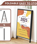 Double Sided 24x36 Inch Street Poster Sign Heavy Duty Folding Sidewalk Board With Slide In Steel Frame Outdoor Indoor Advertising That Grabs Attention For Businesses, shown folded and open with colorful poster.