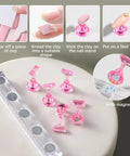 All-In-One Nail Art Kit With 24Pcs Tools, Two Nail Stand Sets shown with pink magnetic stands and clear base for DIY mani