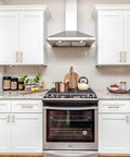 10 Pack 5 Inch Cabinet Pulls Champagne Bronze Gold Finish Dope Zinc Alloy Handles on white kitchen cabinets next to a stove.