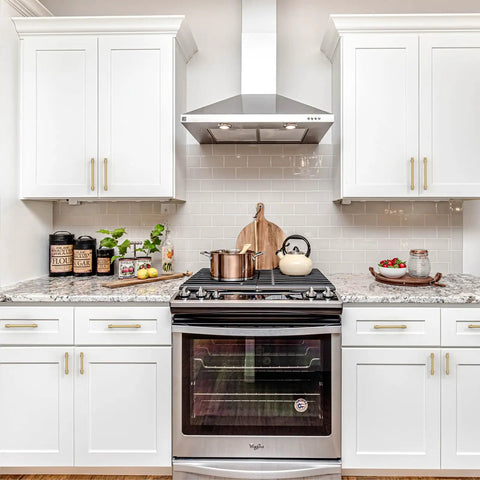 10 Pack 5 Inch Cabinet Pulls Champagne Bronze Gold Finish Dope Zinc Alloy Handles on white kitchen cabinets next to a stove.