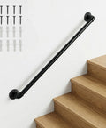 Heavy Duty Four Foot Iron Stair Handrail In Matte Black Finish Rust Resistant Body For Indoor Or Outdoor Staircases With Dead Simple Hardware Setup For Quick Weekend Fixes mounted on staircase with hardware.