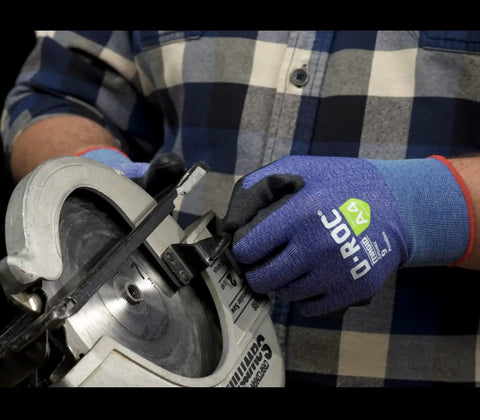 Person using saw while wearing Lightweight AeroDex Polyurethane Palm Coated Work Gloves, ANSI A4 Cut Resistant, Ultra Dexterity