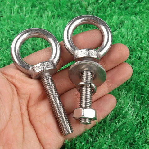 Stainless Steel Eyebolts With Nut Washers 3/8 Inch By 2 Inch M10x50mm Durable Rust Resistant Outdoor Hanging Eye Bolts For Swing Chairs Hammocks Garden Balcony Lights 4 Pack, held in hand on green grass background