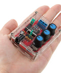 Hand holding XR2206 Precise Function Signal Generator Module Pro Grade DIY Kit in clear case, showing controls and connections.