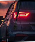 Side view of a car with a Heavy Duty Cup Hooks 4 Pack With Suction Anchors For Camping And Outdoor Travel attached to rear window