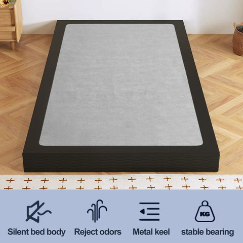 Heavy Duty Twin Bed Box Spring With Noise Free Metal Frame And Thick Fabric Cover For Memory Foam And Innerspring Mattresses Quick Snap Together Assembly Low Riser Sleep Game Changer, top view on wooden floor.