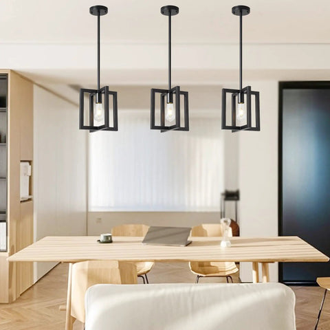 37.5 Inch Black Industrial Pendant Chandelier For Dining Room And Kitchen Island, 6 Light E26 Fixture hanging over table.