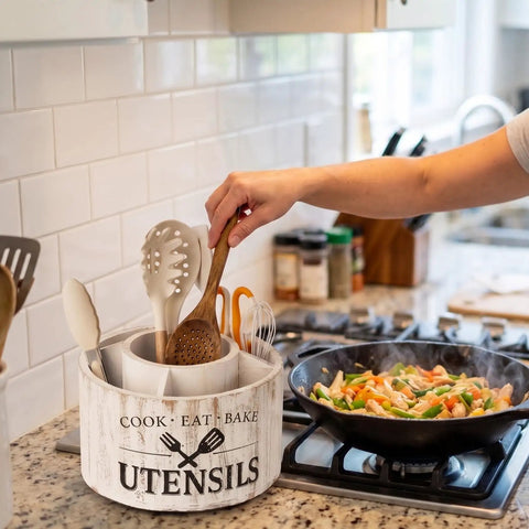 Extra Large 10 Inch Kitchen Utensil Holder With Slick 360 Degree Lazy Susan Spin displaying spatulas and a wooden spoon.