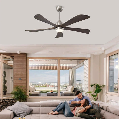 52" 5PCS Solid Wood Blades Ceiling Fan with Lights Remote Control, Nickel installed in a modern living room with couple.