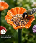 Handmade Ceramic Mini Pollinator Watering Station For Outdoor Gardens with bird feeding on orange flower stake