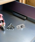 Cool Vintage Iron Luggage Locks With Dual Security For Suitcases And Toolboxes, installed on a toolbox with tools nearby.
