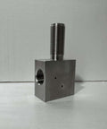 Waterjet elbow spare part: metal square block with tall threaded tube on top and side threaded bore.