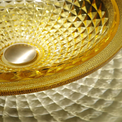 USZWBY Bathroom Vessel Sink Vanity Tempered Glass Vessel Bowl Sink Round Luxury Countertop Sink Bowl Above Counter Sink Art Basin with Waterfall Faucet Pop Up Drain in golden color with textured surface.
