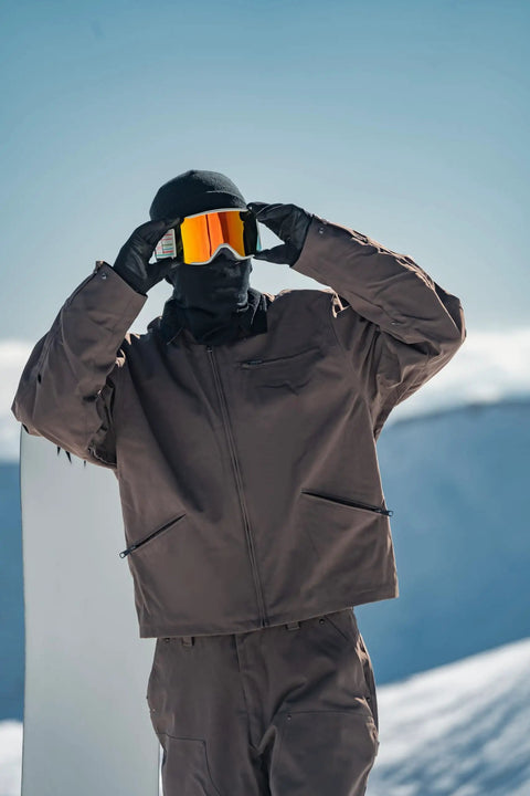 Person wearing Unisex Waterproof Snow Ski Jacket With Fleece Lining Warm Insulated Winter Coat For Snowboarding And Skiing On The Slopes