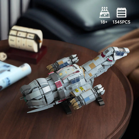 Epic Sci-Fi Spaceship Building Set For Adults, 1345-Piece Space War Ship Model on wooden table with display stand