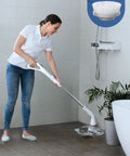 Woman using Cordless Spin Scrubber With LED Display And Detachable D Shape Handle For Bathroom Cleaning on tile floor