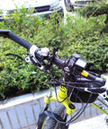 Close-up of bicycle handlebars with attached 20 Pack Safety Stainless Steel Tethers And Coated Security Lanyard Kit For Action Cameras.