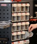 Person using stackable eight drawer tool organizer with tilt out drawers for small parts, workshop and garage cabinet, black.