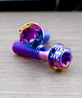 Pack Of 4 Grade 5 Titanium Torx Bolts M10 X 1.25 Pitch Brake Caliper Screws Dual Drive Flange Head close-up shot