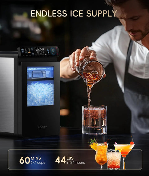 Top Shelf Nugget Ice Maker Countertop Unit cranks out 44 pounds daily, dispensing chewable ice into a glass.
