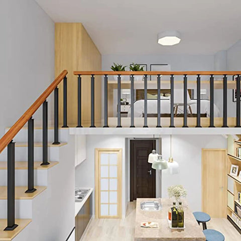 Solid Black Wrought Iron Balusters 90Cm Deck Railing Spindles on staircase with wood railing in modern interior design.