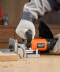 Top Shelf Biscuit Plate Joiner Boasting A 760W Motor Hitting 11600 Rpm For Knockout Joints in use with wood on a worktable.