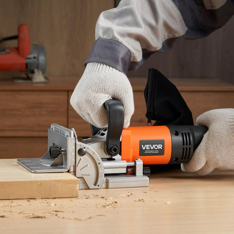 Top Shelf Biscuit Plate Joiner Boasting A 760W Motor Hitting 11600 Rpm For Knockout Joints in use with wood on a worktable.
