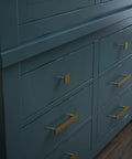 Brushed Gold Cabinet Pulls Set Of 10 With Five And One Sixteenth Inch Center To Center 128mm Casual Square Handles installed on blue drawer