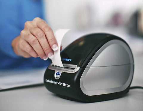 LabelWriter 450 Turbo Direct Thermal Printer in use, printing inkless label, compact design, ideal for office tasks.