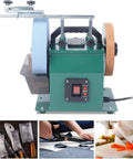 Electric Knife Sharpener Wet Stone Grinder Two Direction Multi Purpose Bench Tool With Ergonomic Handle and Durable Build view from side with water cooling feature.