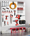 Heavy Duty Metal Pegboard Wall Organizer Kit 74 Piece Set White 24 By 24 Inches For Garage Workshop Craft Room Office And Kitchen Tool Organization Rust Resistant Durable Storage System showing tools arranged on a wall