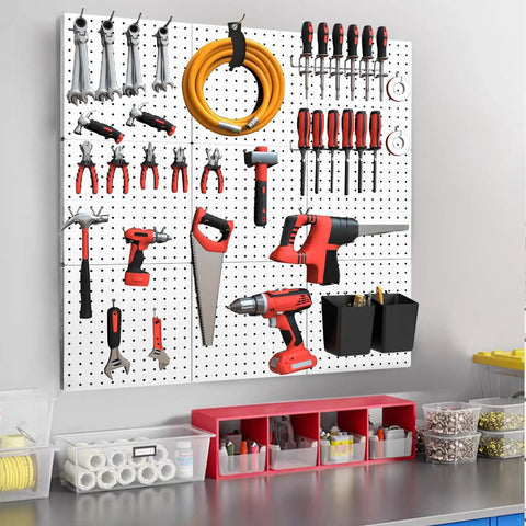 Heavy Duty Metal Pegboard Wall Organizer Kit 74 Piece Set White 24 By 24 Inches For Garage Workshop Craft Room Office And Kitchen Tool Organization Rust Resistant Durable Storage System showing tools arranged on a wall