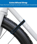 Bike Wall Mount Rack With Shelf And Hooks For Indoor Garage shown with extra wheel strap fixing front wheel to prevent movement.