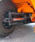Close-up of the wheel assembly of Electric Pallet Stacker Heavy Duty Forklift 1 To 3 Ton Capacity Compact Design for material handling.