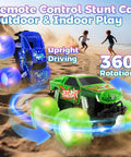 Colorful remote control stunt cars performing tricks on sandy beach, showcasing upright driving and 360-degree rotation features.