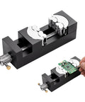 Heavy Duty Fractal Vise Giving You A Sweet Knockout Grip For Drill Press And Bench Clamping with circuit board for precise work.