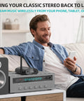 Man streaming music via DS500 Hi-Res Bluetooth 5.3 Receiver With Audiophile 32-Bit 384kHz DAC, Lossless LDAC And AptX HD, OLED Display