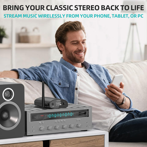 Man streaming music via DS500 Hi-Res Bluetooth 5.3 Receiver With Audiophile 32-Bit 384kHz DAC, Lossless LDAC And AptX HD, OLED Display