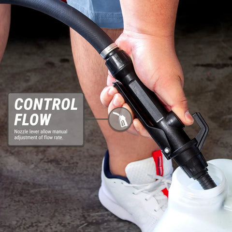 Hand holding nozzle control for Badass Electric Drum Pump With Telescopic Suction Hose for adjusting flow rate during transfer.