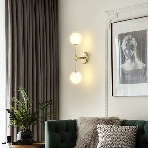 Modern Wall Sconce 2 Light Industrial Mid Century Vanity Light With White Globe Glass Shade Brushed Brass Gold Finish For Bathroom Or Hallway Sleek Home Decor That Pops mounted on living room wall