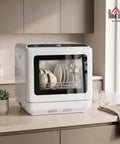 Game Changing Portable Countertop Dishwasher Featuring A Built In Water Tank And Five Wash Cycles To Run, compact design with dishes visible.