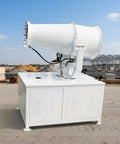 Heavy duty mobile fog cannon sprayer on a construction site, built tough to handle dust control with water mist technology.