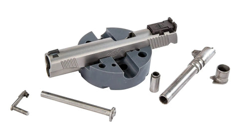 Universal Bench Block With Non Marring Urethane Construction For Pistols And Gunsmithing, dual-sided with gun parts displayed