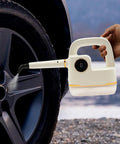 Handheld Steam Cleaner With 6 Speed Adjustable High Temperature And Digital Display 41 Inch Extension Hose 10 Tool Attachments Multi Surface Steamer For Deep Cleaning Home Furniture And Car Boss Level Clean in use on car wheel