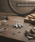 Compact Snowflake Shaped Multi Tool Wrench for Eyewear Bike and Camping Repairs on wooden table with screws and glasses